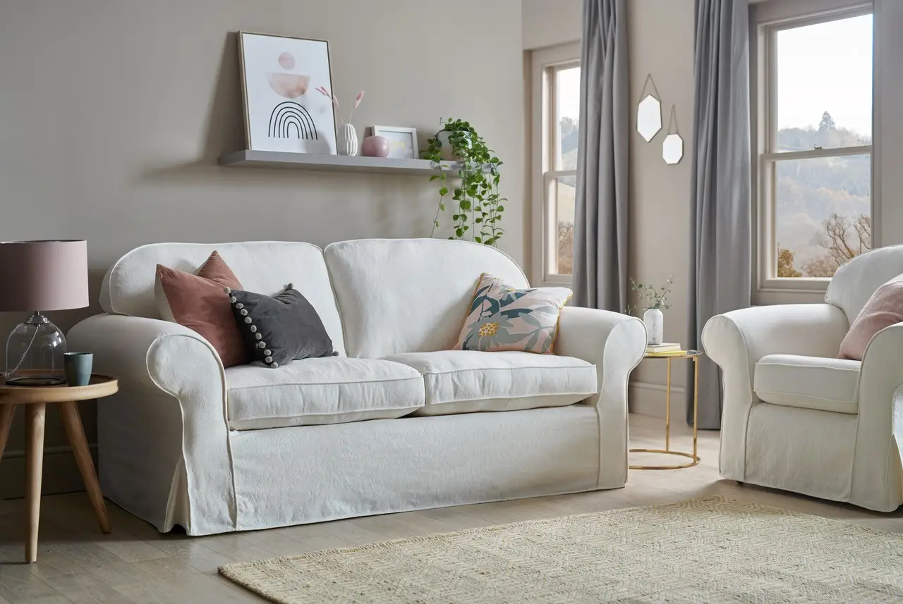 A light coloured sofa in a living room