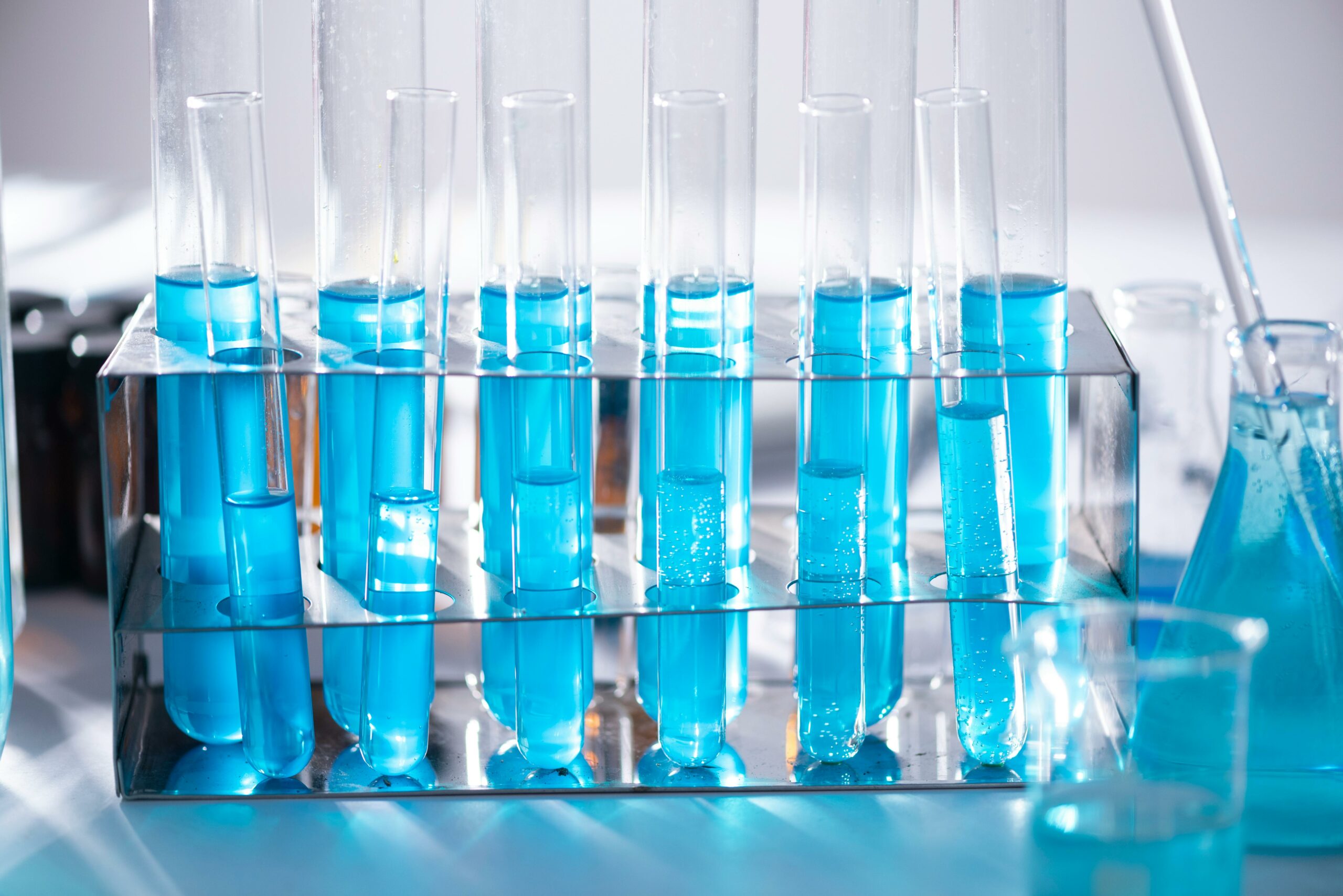 Test tubes filled with blue liquid