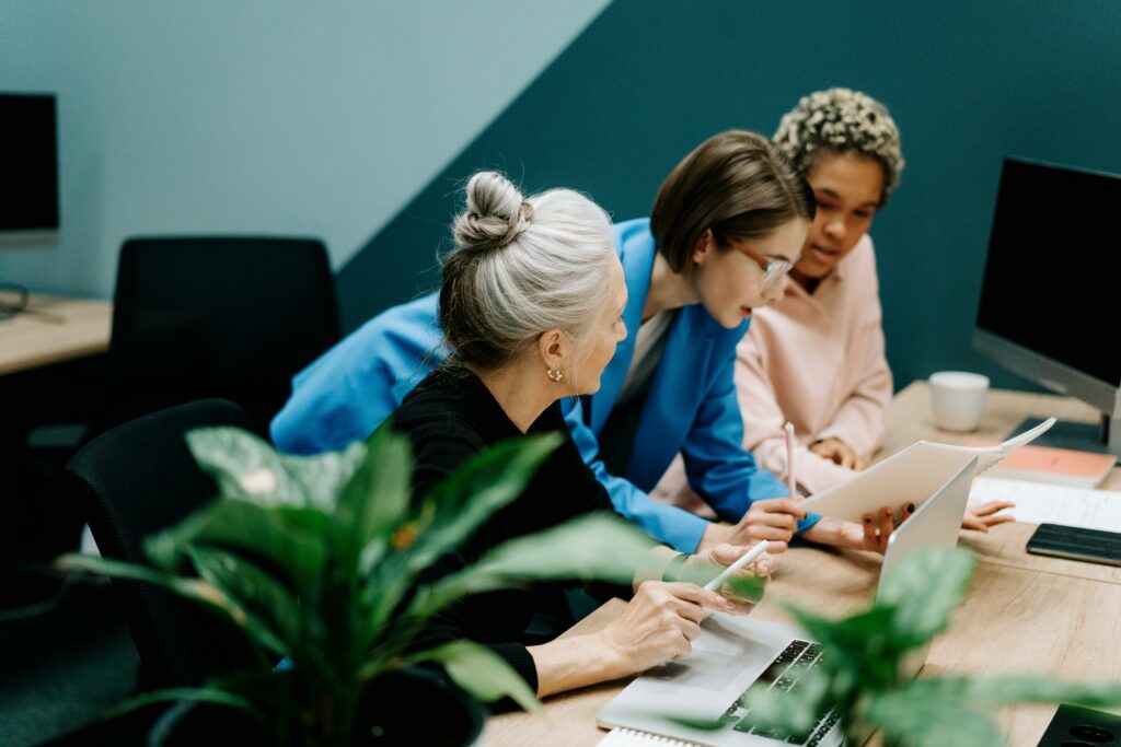 Employees looking at documents in an office